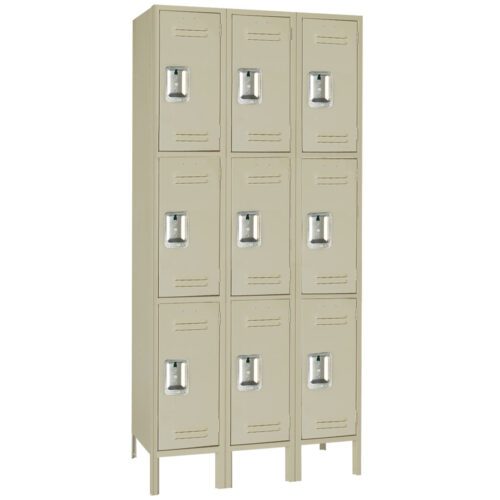 lyon-metal-locker-triple-tier-icm-three-wide-putty.jpg A beige metal locker unit with nine compartments, arranged in three rows and three columns. Each locker has a vertical ventilation slot and a metal handle. The unit stands on four legs.