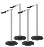 Four silver stanchions with black bases from the Visiontron Outdoor ST600 Series Flat Top Bundle are linked by black ropes with clips in a rectangular setup.