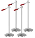 The Visiontron ST400 Series Urn Top Stanchion Bundle includes four stylish silver stanchions with round bases and a plush red velvet rope, ideal for crowd control or guiding lines at events, offering sophistication and order to any venue.