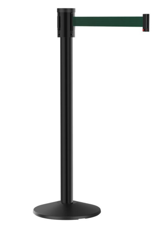 A black crowd control stanchion with a retractable green belt is shown against a white background. The stanchion has a round base and a vertical pole with the belt extended horizontally.
