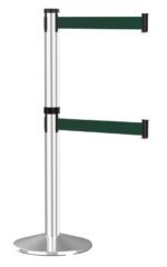 A metallic stanchion with two retractable green belts, designed for crowd control, standing on a round base.