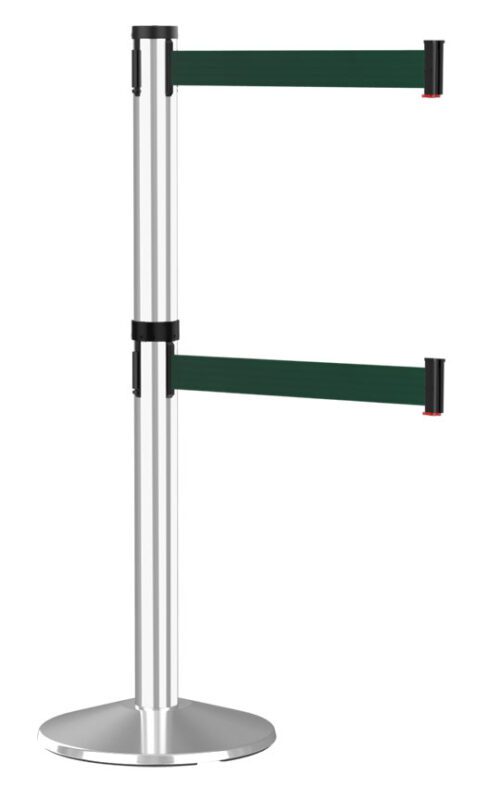 A metallic stanchion with two retractable green belts, designed for crowd control, standing on a round base.