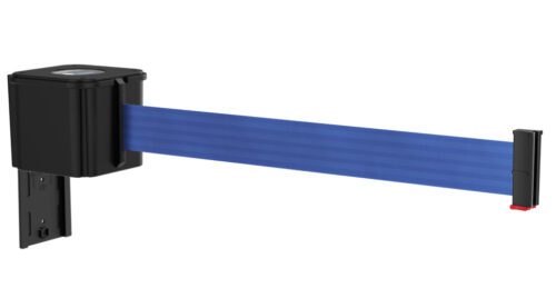 A black wall-mounted retractable belt barrier with a blue strap extended outward.