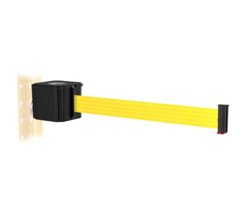 A yellow retractable barrier tape extends from a black wall-mounted unit, attached to a light-colored wooden surface with evenly spaced holes. The end of the tape has a black and red tip.