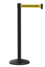 A black stanchion with an extended yellow belt displaying the text CAUTION-DO NOT ENTER.