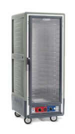 The full-height Metro C539-CLFC-4-GYA C5 3 Series Insulated Holding/Proofing Cabinet in gray features a full-length clear door, fixed wire slides, bottom front controls with temperature display, wheels, and operates on 120V, 60Hz, 1440W power.