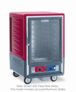 The Metro C535-CXFC-LA C5 3 Series is a 1/2 height insulated holding/proofing cabinet on wheels with a full-length clear door, red top panel, and gray body. It features temperature controls, fixed wire slides, lip load aluminum slides, and operates at 220-240V for industrial use.