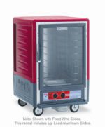 The Metro C535-HLFC-L C5 3 Series 1/2 height insulated holding cabinet features a red top, grey base, full-length clear door, and multiple shelves with lip load aluminum slides. It operates on 120V, is mobile with wheels, and has a control panel at the bottom front.