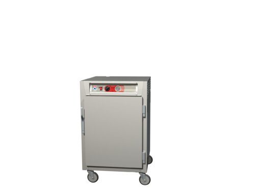 The Metro C565X-SFS-UPFSA is a sleek, silver, 1/2 height holding cabinet on four wheels with a full-length solid door and universal wire slides. It features a handy control panel with a red dial and buttons, perfect for blending form and function against any backdrop.