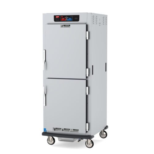 The Metro C599L-SDS-LA C5 9 Series heated cabinet, full height with Dutch solid doors, moves easily on caster wheels and includes lip load aluminum slides. It has a digital display, operates at 120V, features ventilation slits on the sides and top, and its control panel shows red and blue indicators above the upper door.