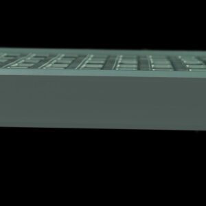 Close-up view of a partially blurred rectangular object, resembling the side view of a gray Metro CSM6-GRQ Color Shelf Marker for Super Erecta Pro and MetroMax Q Industrial Plastic Shelving, set against a black background.