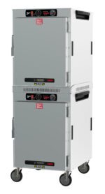 The Metro HBCW16-AS-M HotBlox Wide 16-Pan Insulated Dual-Cavity Mobile Holding Cabinet features a stainless steel finish, dual stacked compartments with analog controllers, and iconic red Hot Blox logo on solid doors. Its equipped with wheels for easy mobility and runs on (2X) 120V, 875W power.