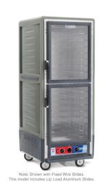 The Metro C539-MDC-L-GY is a gray, full-height insulated cabinet with Dutch Clear Doors and lip load aluminum slides. It features metal shelves, control knobs at the bottom, and wheels for mobility. Suitable for 120V, 60Hz operations.