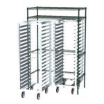A green metal shelving unit supports two Metro CR742448DOCK Docking Stations, tall and silver, with multiple shelves. Designed for easy mobility and storage optimization, these racks provide a perfect organizational solution for any space.