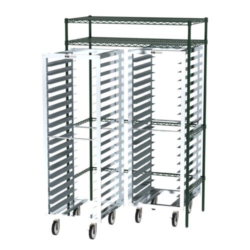 A green metal shelving unit supports two Metro CR742448DOCK Docking Stations, tall and silver, with multiple shelves. Designed for easy mobility and storage optimization, these racks provide a perfect organizational solution for any space.