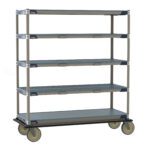 The Metro ECT56CX3 MetroMax i Transport and Exchange Cart boasts a four-tier wheeled design with 24 x 60 gray shelves, a beige frame, rubber wheels for seamless movement, and perforated shelves for airflow, ideal for industrial or office storage.