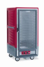 The Metro C537-HLFC-4A is a 3/4 height, red insulated holding cabinet with a full-length clear door. It features fixed wire slides and metal shelves inside, with wheels and control knobs for optimal temperature during transit. Operates at 120V, 60Hz, and 1440W.