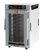 The Metro HBCN8-AC-CT HotBlox Narrow 8-Pan Insulated Countertop/Stacking Holding Cabinet has a clear door, an analog controller, and runs on 120V. It features metal shelves, side handles, and a top control panel with a temperature dial and power switch.