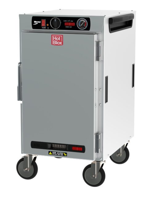 8r4z16zrlf5pbznjtc1nrndzahx72374.jpg The Metro HBCN8-AS-M HotBlox Narrow 8-Pan Cabinet features a silver design with wheels, analog controller, 875W power capacity, clear temperature gauge, top ventilation panel, and Hot Blox logo on the solid door. Powered at 120V, 60Hz with NEMA 5-15P plug.