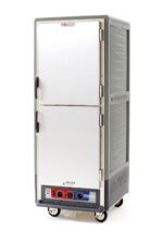 The Metro C539-MDS-4-GY is a full-height, gray insulated cabinet with Dutch solid doors and handles. Mounted on wheels for easy mobility, it features temperature control dials at the base and operates on 120V, 60Hz power, ideal for efficient food storage or transport.