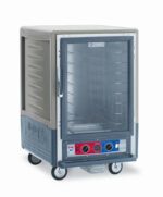 The Metro C535-CLFC-4-GY C5 3 Series Insulated Holding/Proofing Cabinet is a mobile, 1/2 height gray unit featuring a full-length clear door, fixed wire slides, temperature control dials, side handle, and shelves to efficiently store trays.