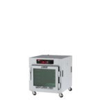 The Metro C583L-SFC-UA C5 8 Series Insulated Reach-In Holding Cabinet is a silver undercounter unit with a full-length clear door, universal wire slides, and digital display panel. It operates at 120V, 60Hz, and 1440W, all against a plain white background.
