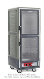 The Metro C539-HXDC-L-GY C5 3 Series Insulated Holding Cabinet is a full-height gray model featuring Dutch clear doors, lip load aluminum slides, and operates at 220-240V, 50/60Hz. It rolls smoothly on wheels and has a side handle for easy mobility.