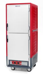 The Metro C539-HDS-4 C5 3 Series Holding Cabinet showcases a tall, red design with Dutch solid doors and side handles on wheels. Features include a control panel with knobs at the base near the brand logo. It functions at 120V, 60Hz, and 2000W against a plain white background.