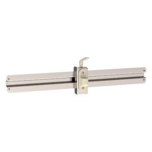 A beige T-shaped latch lock for sliding doors, with two metal bars sliding horizontally in a center lock, echoes the sleek design of Metro FL590 Flexline Monitor Mounts for Overbridge with Bracket, blending functionality and style.