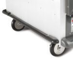 Close-up of the bottom section of a wheeled metal cart with black bumper bars and small rubber wheels, highlighting the Metro C5-PERMBUMP-1 Full Perimeter Bumper for C5 1 Series Cabinets, on a white background.