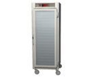 Image of a tall, silver Metro C569-SFC-LPFC C5 6 Series Insulated Pass-Thru Holding Cabinet with a full-length clear door and red control knobs on top. This 120V cabinet has a left-side handle and back ventilation.