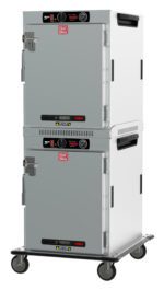 The Metro HBCW16-AS-T HotBlox features a dual-cavity design with solid doors and analog controls. It includes (2X) 120V, 60Hz, 875W power, NEMA 5-15P plugs, a latch and temperature gauge on each door, mounted on wheels for mobility.