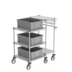 The Metro CR243840-PC Picking Cart, measuring 24 x 38 x 40, features a gray utility design with three stacked plastic bins, a sturdy metal frame on four swivel wheels, and a flat top shelf for easy maneuverability. The cart is empty and set against a white background.