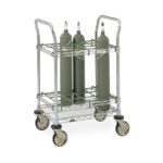 The Metro ITC12C Inhalation Therapy Cart, made of metal and equipped with wheels, holds three large green gas cylinders and includes two shelves and dual handles for easy transport, enhancing inhalation therapy efficiency.