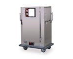 The Metro MBQ-90 One-Door Banquet Cabinet is a compact, sturdy stainless steel commercial food warmer with a 1650W, 60Hz Standard Electric Thermal System. It has large side handles, a wheeled base, and a front control panel with buttons and a display, designed for industrial use.