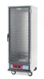 The Metro C519-HXFC-4 C5 1 Series is a full-height stainless steel holding cabinet with a transparent door, multiple shelves, and fixed wire slides. Operating at 220-240V and 50/60Hz, it has a bottom control panel with knobs/buttons and wheels for easy mobility.