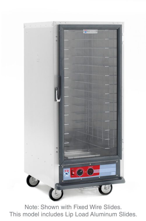 The Metro C517-HXFC-L C5 1 Series Holding Cabinet, featuring a tall, stainless steel build with lip load aluminum slides and a clear door for visibility, is 3/4 height with a bottom control panel. Its on wheels and operates at 220-240V, 50/60Hz.