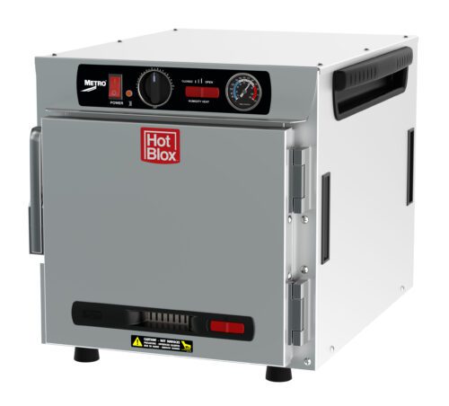 lvioi0y05unqyyb2dtpo24bet8rh2n1p.jpg The Metro HBCN4-AS-CT HotBlox is a sleek silver food warmer with a solid door featuring a red logo. It runs on 120V, 60Hz power, has an analog temperature controller, LED indicator, black side handles, four legs for stability, and connects via a NEMA 5-15P plug.