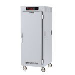 The Metro C589X-SFS-UPFCA C5 8 Series Insulated Pass-Thru Holding Cabinet, a tall rectangular metal appliance on wheels, has Universal Wire Slides, a solid door with handle, digital temperature display, and vented panel. It operates efficiently at 220-240V.