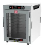 The Metro HBCW8-AC-CT HotBlox Wide 8-Pan Holding Cabinet features a clear door, an analog controller for temperature precision, and a rectangular interior with multiple shelves for efficient stacking. It operates at 120V, 60Hz, 875W, and is equipped with a NEMA 5-15P plug.