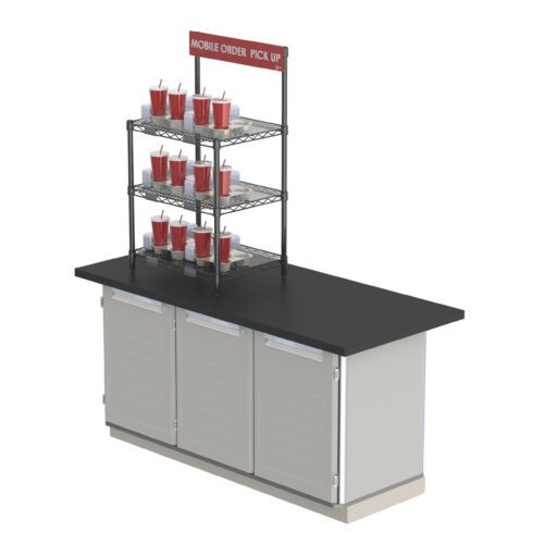 A Metro CR1824TG3B 3-Shelf Countertop Wire Shelving with Sign sits on a black counter, labeled Mobile Order Pick Up, its metal tiers holding several red cups with lids and straws. The sleek setup rests on a white base with panel doors.