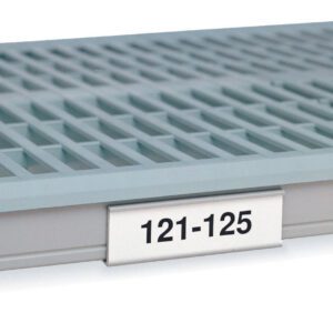 A close-up of a grey plastic grid shelf with the Metro 9989PX Label Holder for MetroMax i Industrial Plastic Shelving features a textured, lattice-like surface and a small white label displayed as 121-125 in black on the 4.25 L holder.
