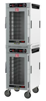 The Metro HBCN16-AC-M HotBlox is a dual-cavity, mobile holding cabinet featuring two narrow 16-pan stainless steel units, each with a clear door and analog controls. Its NEMA 5-15P compatible for kitchens operating at 60Hz.