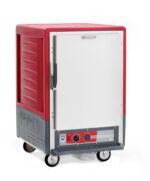 The Metro C535-HXFS-L C5 3 Series Insulated Holding Cabinet is a red, mobile culinary tool with a full-length solid door and lip load aluminum slides, featuring control buttons and a digital display. It operates on 220-240V, 50/60Hz, and expertly maintains food temperature.