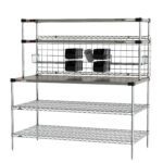 The Metro CRHSP-3060 Prep Workstation with Overhead Super Erecta Hot Heated Shelves is a 30 x 60 metal unit featuring three shelves, a work surface, and a back grid with small black bins—perfect for efficiently organizing smaller accessories. Safety labels are on the top shelf; bottom shelves offer ample storage.