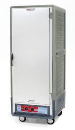 The Metro C539-HLFS-U-GY C5 3 Series Insulated Holding Cabinet is a full-height, stylish gray unit on wheels with Universal Wire Slides and a full-length solid stainless steel door. It features control knobs, a digital display at the base, and runs on 120V/1440W power for functionality.