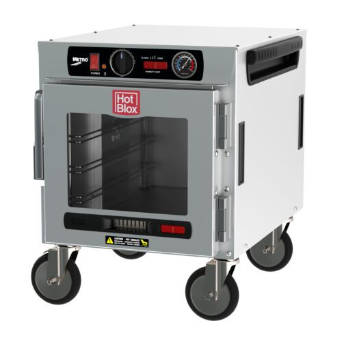 The Metro HBCN4-AC-UC HotBlox Narrow 4-Pan Insulated Undercounter Holding Cabinet is a stainless steel, portable food warmer with an 875W, 60Hz power system. It includes a clear glass door, an analog controller with a temperature dial, side handles for mobility, and the red Hot Blox logo.