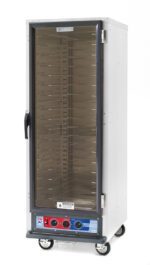 Introducing the Metro C519-PFC-UA C5 1 Series Proofing Cabinet: a full-height, mobile food warmer with universal wire slides, a clear front door with black handle, and a control panel featuring red and blue dials. It operates at 120V, 1440W and is equipped with four wheels.