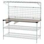 The Metro CR2460GDT Drive-Thru Workstation with Grid and Cash Drawer Bracket features a 24 x 60 metal wire shelving unit, tabletop surface, grid back panel, two lower shelves, silver-finished sturdy structure with a top shelf and cash drawer bracket for organized storage and workspace.