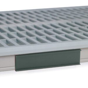 A close-up of a Metro CSM6-GRX Color Shelf Marker for MetroMax i, featuring a gray rectangular plastic grid platform with small square openings and a dark green panel underneath.